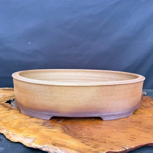 16.75″ Oval Tan Handmade Jack Hoover Bonsai with Plum-Brown Fade & Cutout Feet – No. 670
