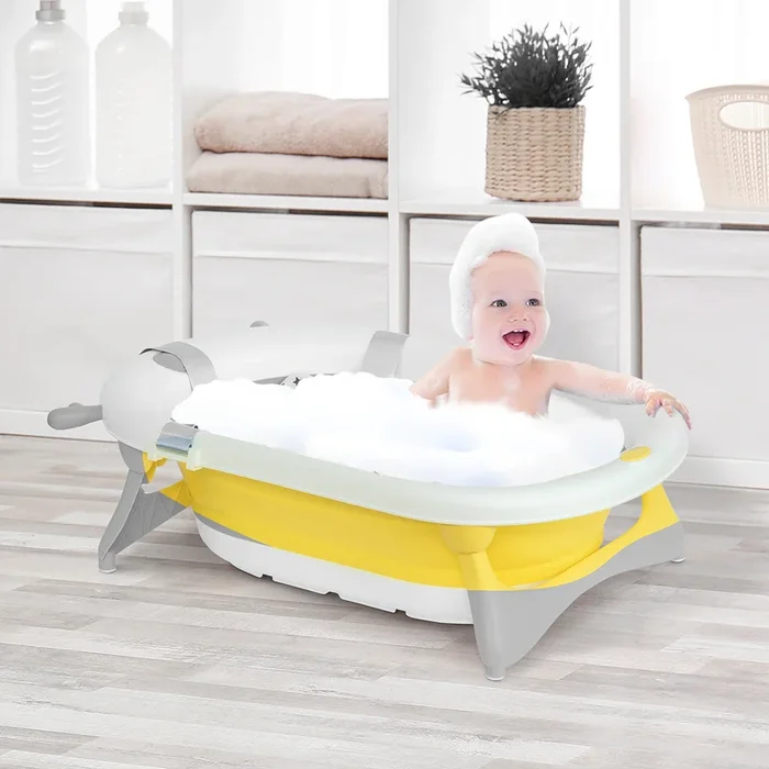HOMCOM Collapsible Baby Bath Tub Foldable Ergonomic with Cushion Temperature Sensitive Water Plug Non-Slip Support Leg Portable for 0-3 Years, Yellow