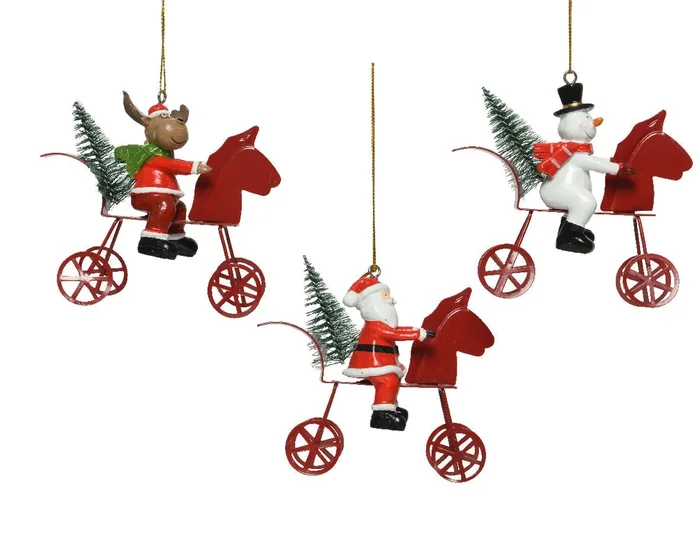 Iron Christmas Figures on Bikes with a mini Christmas Tree